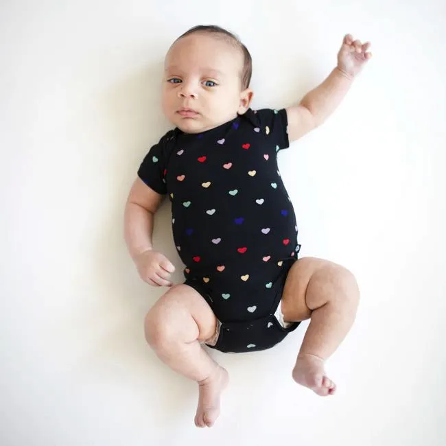 Kyte Baby Short Sleeve Printed Bodysuit in Midnight Rainbow Heart